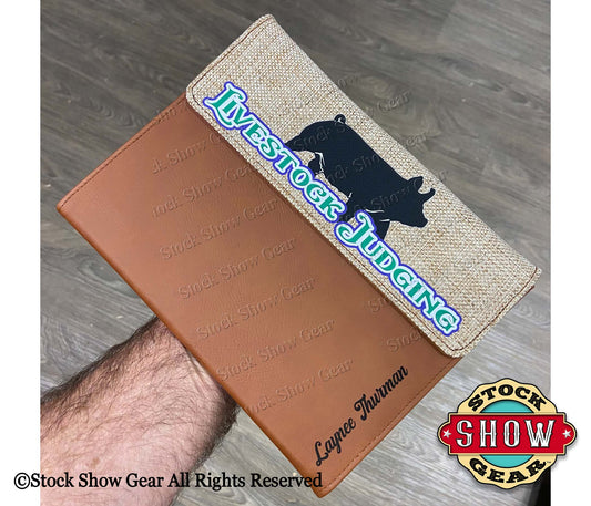A leatherette/burlap personalized swine livestock judging portfolio by Stock Show Gear