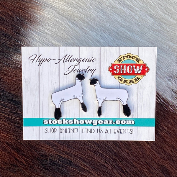 Black and white lamb enamel hypo-allergenic post earrings displayed on card.